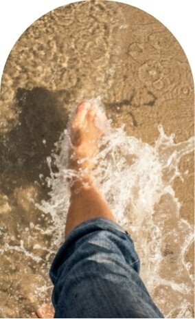 Person's foot in water